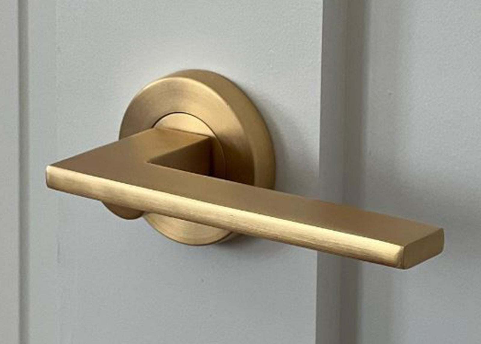 Manovella Hamilton Passage Set Installed on White Door