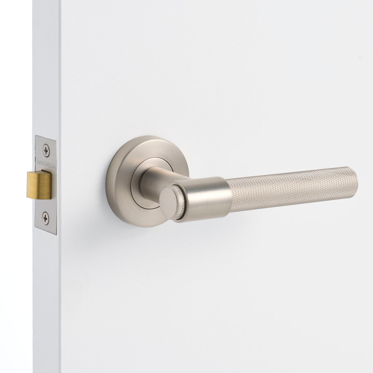 Brushed Nickel Passage Door Handle Installed on a Door
