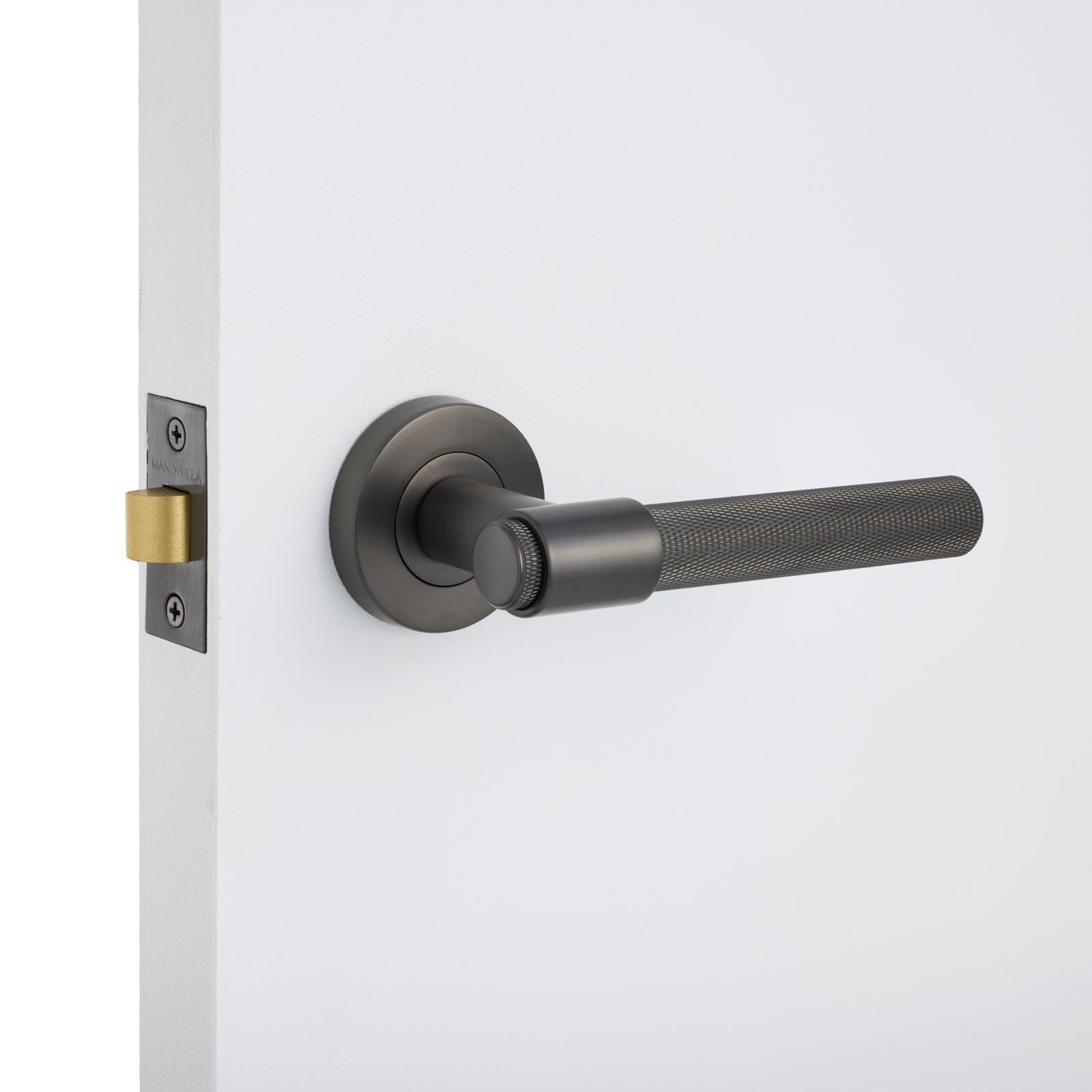 Gunmetal Passage Door Handle Installed on a Door