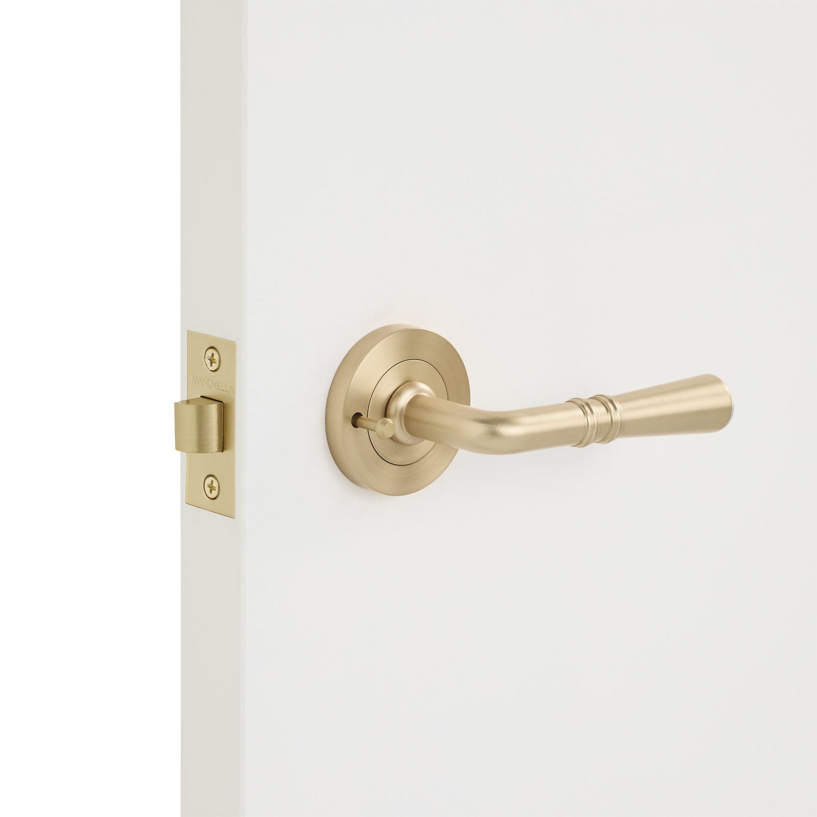 Satin Brass Privacy Door Handle Installed on a Door