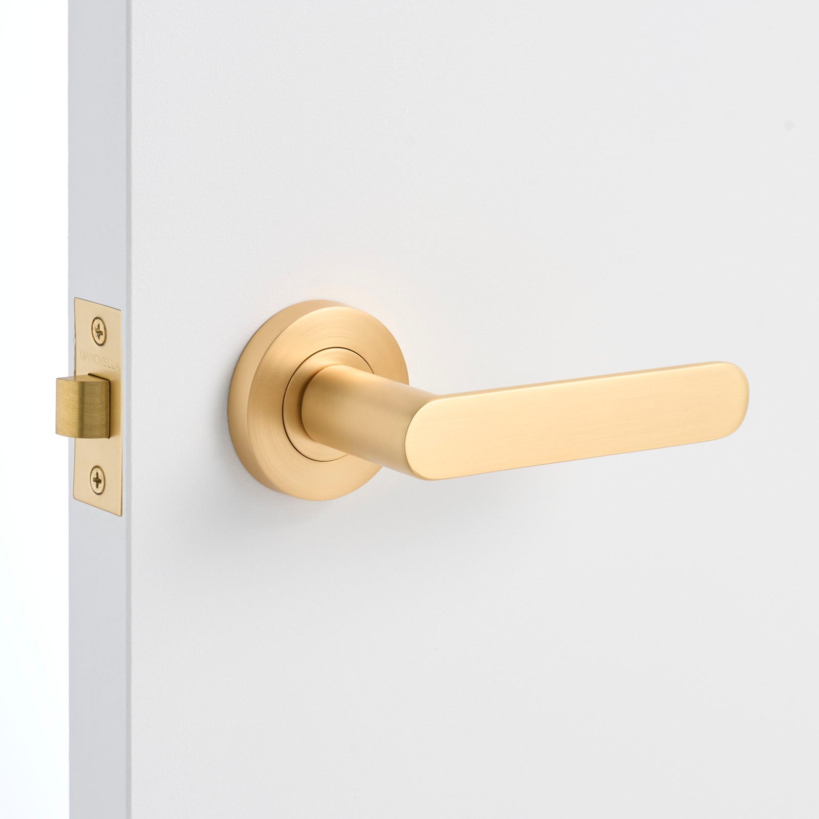 Satin Brass Door Handle Installed on a Door