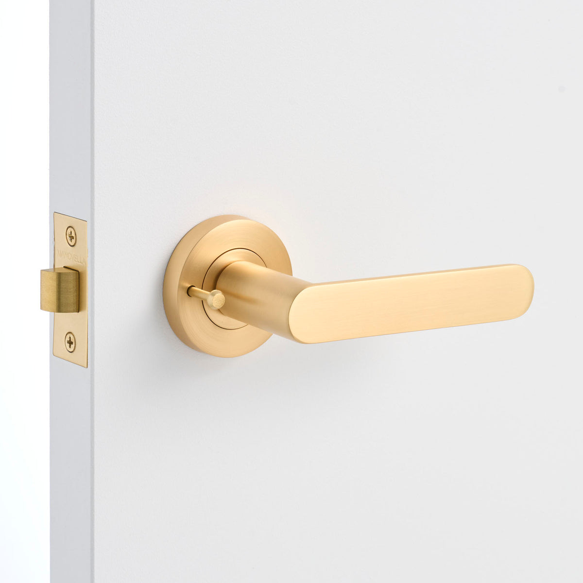 Satin Brass Privacy Door Handle Installed on a Door