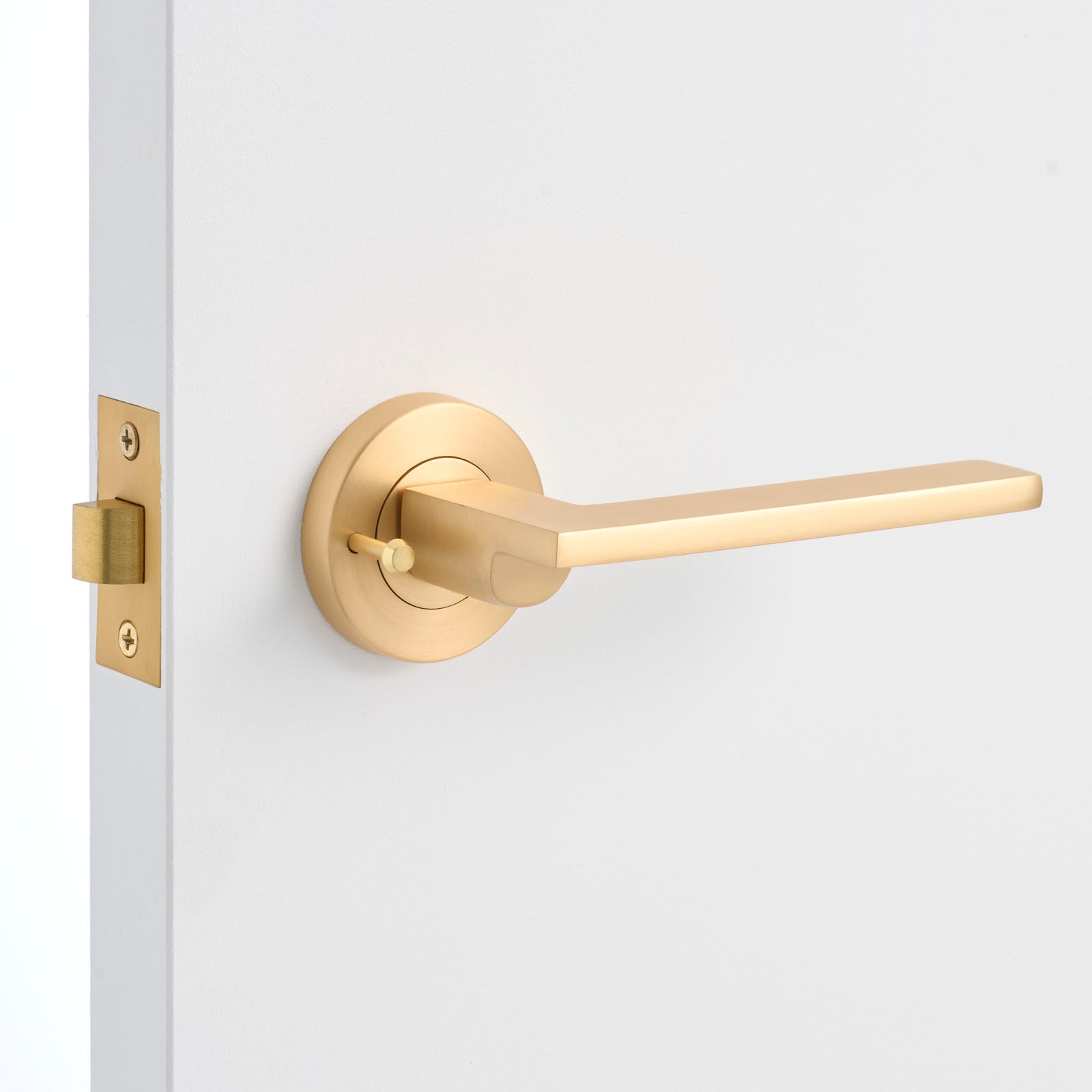 Satin Brass Privacy Door Handle Installed on a Door